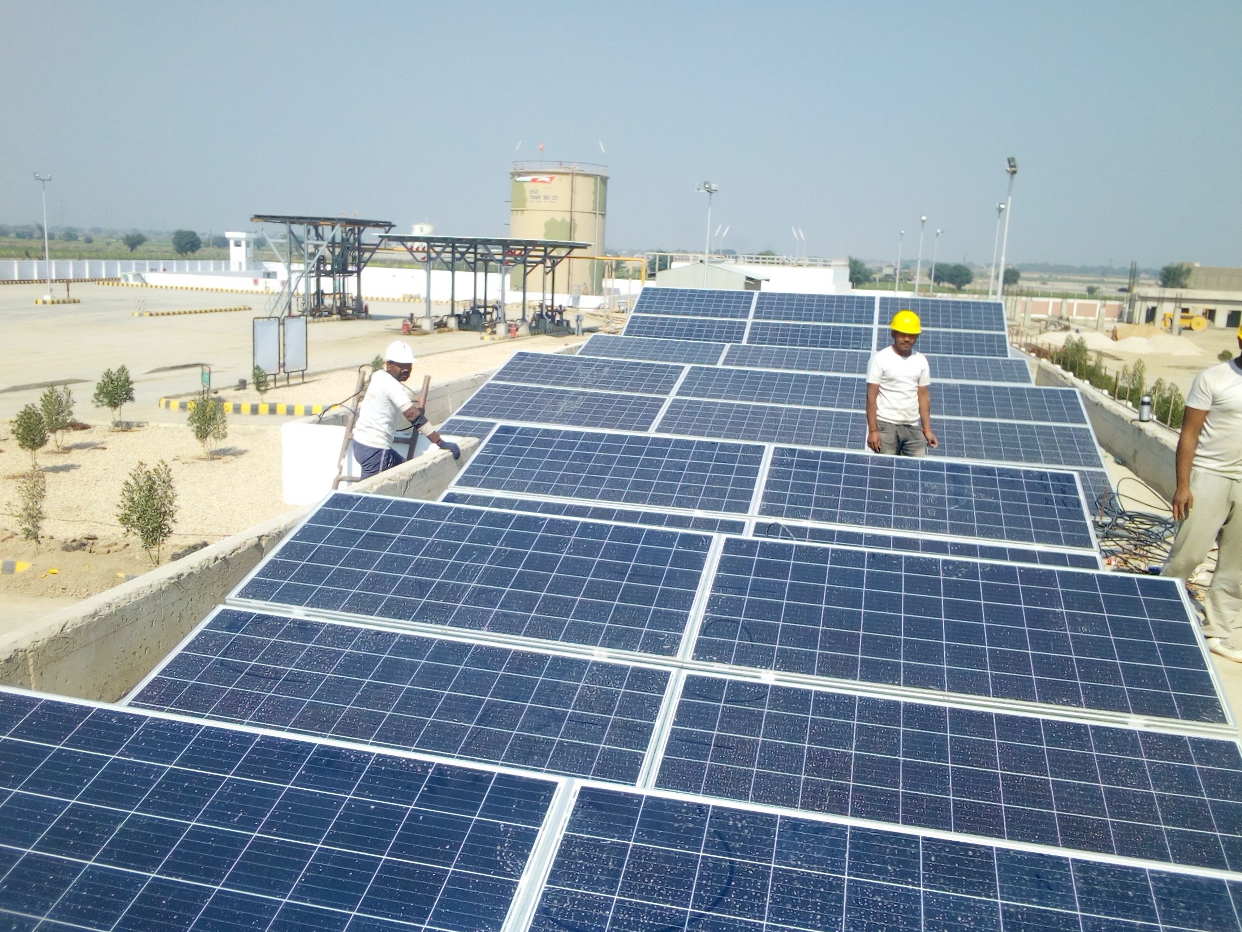 Team working at a commercial solar installation